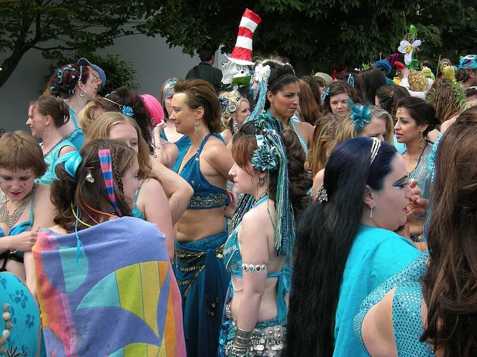 Dr. Seuss - Waiting to march in the Summer Solstice Parade and Pageant 2009, Seattle, Washington. In the back is someone dressed as Dr. Seuss's Cat in the Hat.