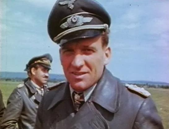 Hans-Ulrich Rudel - Hans-Ulrich Rudel after his capture. In the background: Adolf Galland
