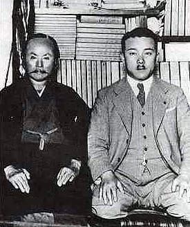 Gichin Funakoshi - Photo: Gichin Funakoshi with Yasuhiro Konishi