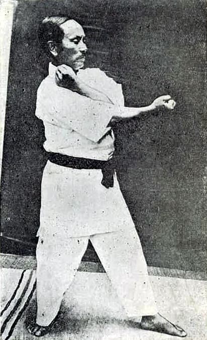 Gichin Funakoshi - Gichin Funakoshi performing the second movement of kata Heian Nidan