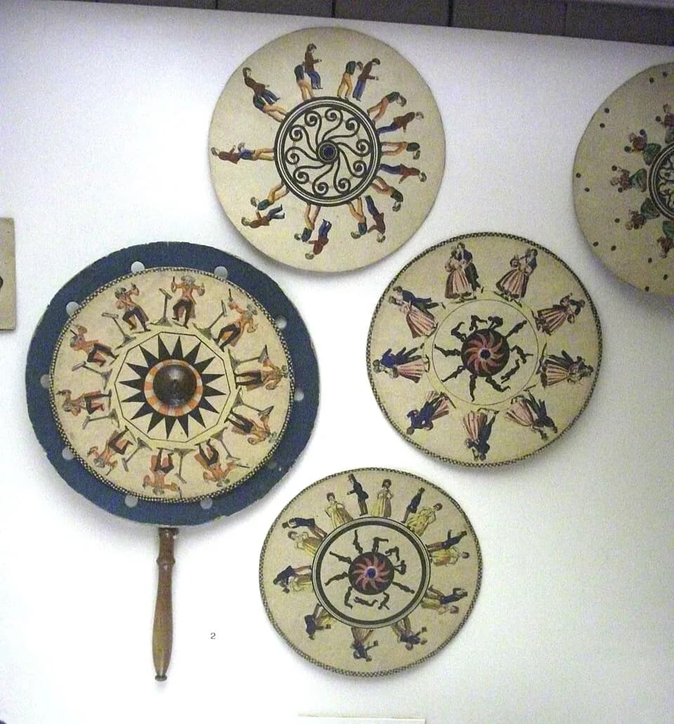 Joseph Plateau - A phenakistoscope (described in the display as a "Phantasmascope") with cards.  On display in Bedford Museum.
