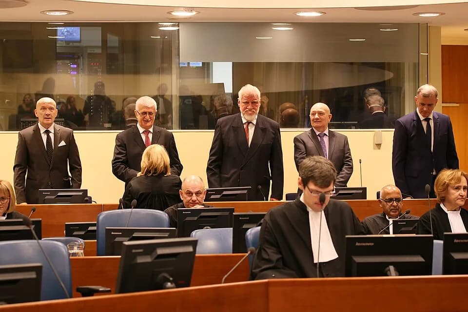 Slobodan Praljak - Jadranko Prlić, Bruno Stojić, Slobodan Praljak, Milivoj Petković, and Valentin Ćorić - five out of the six Defence appellants in the Prlić case - at the Prlić Appeals Judgement.