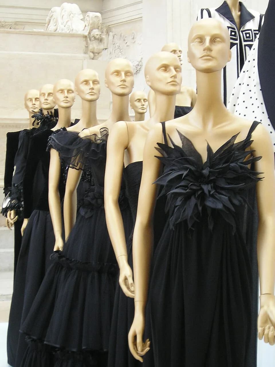 Valentino - A collection of black dresses by Valentino at the exhibition "Valentino a Roma" at Museo Ara Pacis in Rome