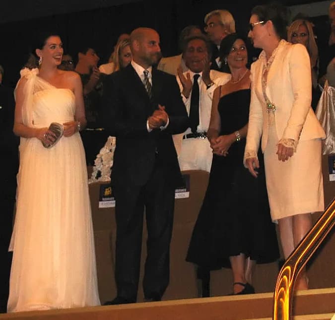 Valentino - At the Venice premiere of The Devil Wears Prada: Front row: (left to right) Anne Hathaway, Stanley Tucci, Lisa Tucci and Meryl Streep. Valentino can be seen behind and between Stanley and 