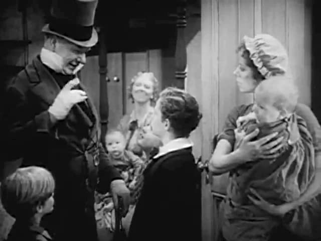 Elsa Lanchester - Screen capture from the trailer of David Copperfield (1935 film).Here Mr. Micawber (played by W. C. Fields) addresses young David Copperfield (Freddie Bartholomew).
