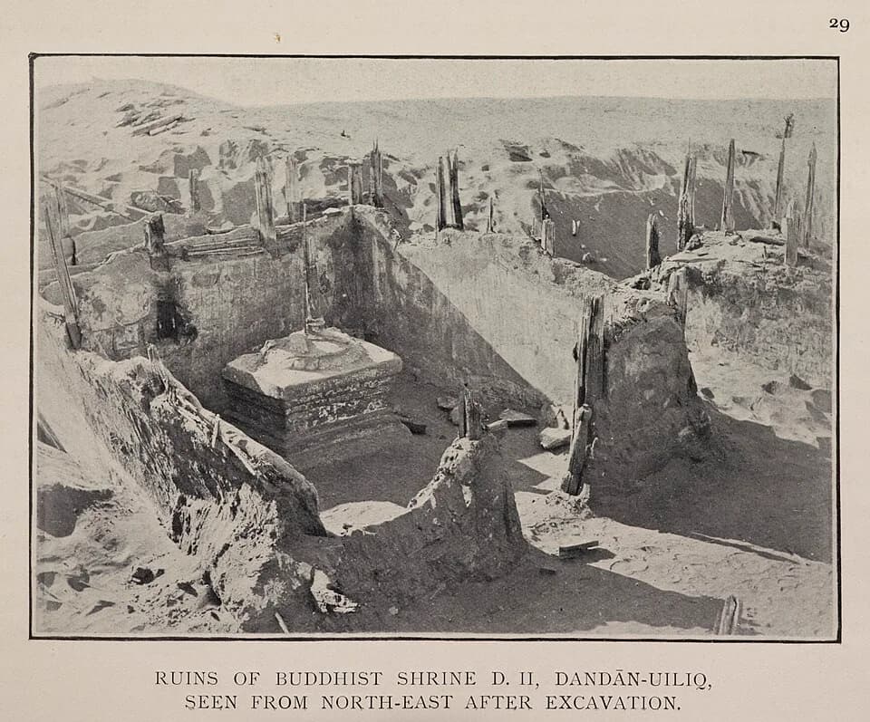 Aurel Stein - Ruins of Buddhist shrine D.II., Dandan-Uiliq, seen from northeast after excavation.