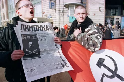 Eduard Limonov - Members of the Russian Neo-bolshevik party hold a copy of the newspaper "Limonka" at a protest rally in Moscow. Photo by Mikhail Evstafiev.