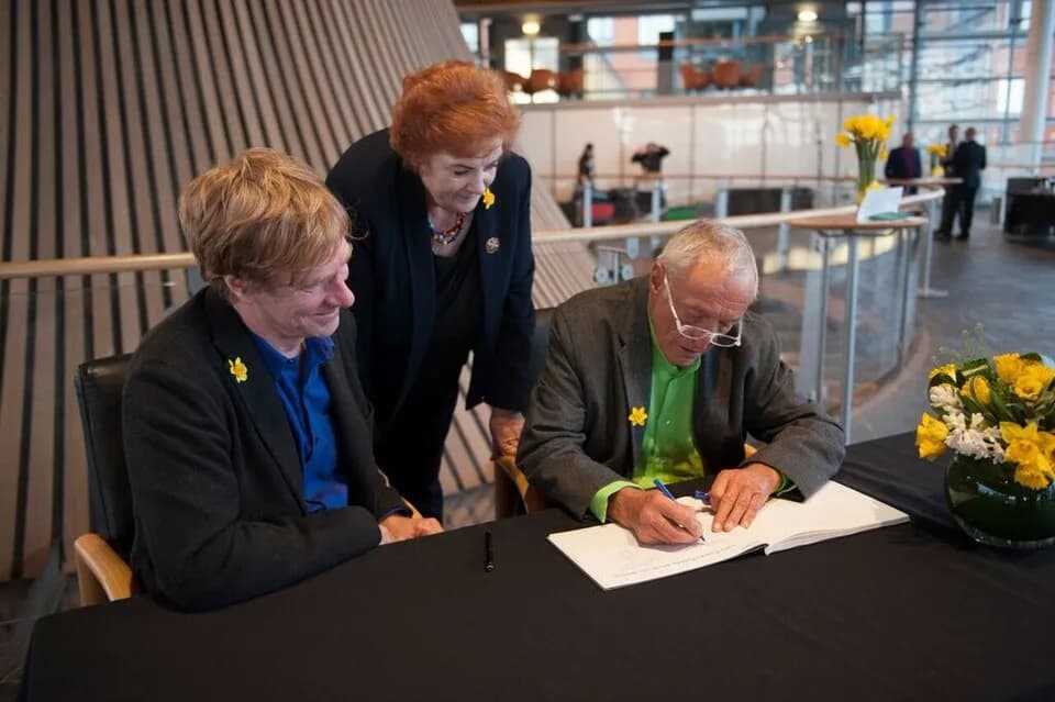 Richard Rogers - Ivan Harbour and Rosemary Butler, with Richard Rogers signing the visitor book at the Senedd, Cardiff, Wales