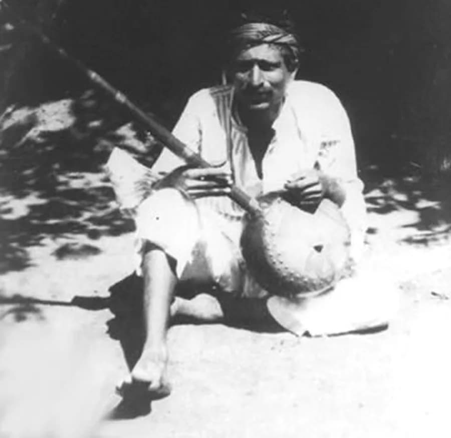 Meher Baba - Meher Baba with a banjo in 1922