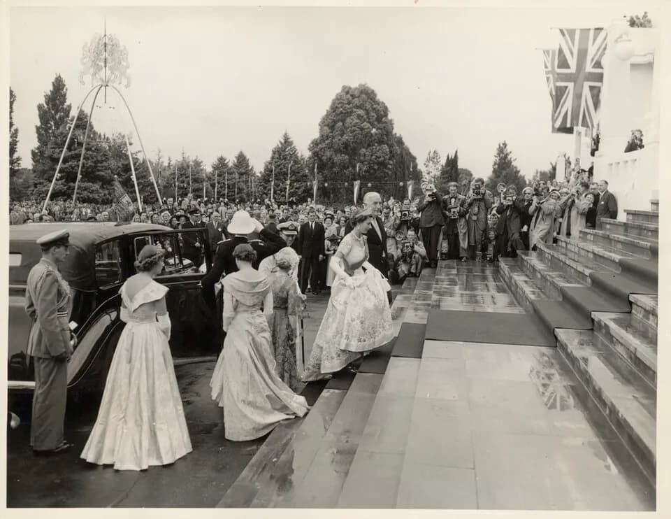 Robert Menzies - Wearing her coronation robes, Her Majesty arrives at Parliament House, Canberra, and, escorted by the Prime Minister, Mr. R.G. Menzies, mounts the steps to open the third session of t