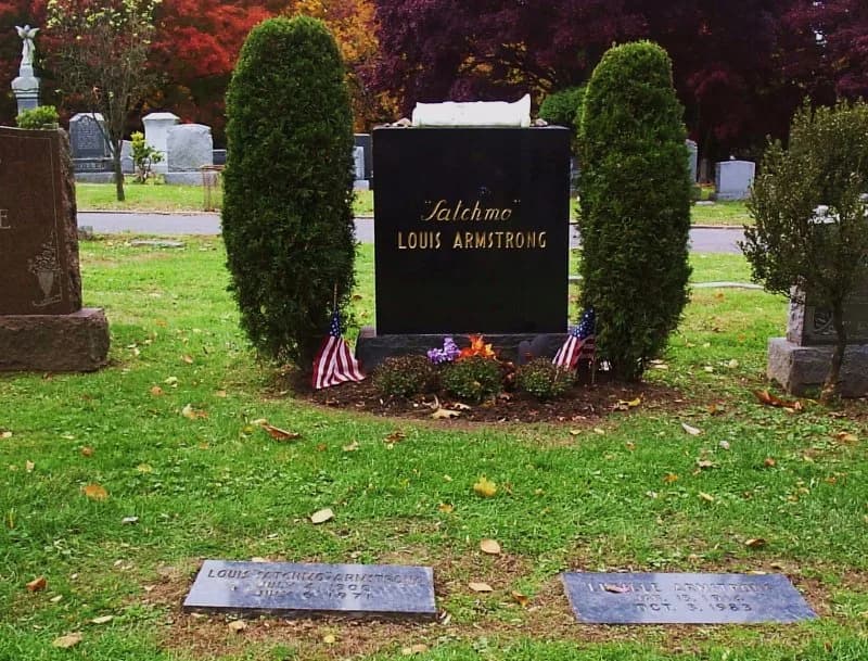 Louis Armstrong - Gravestone and tomb of jazz great Louis "Satchmo" Armstrong.