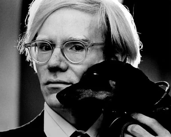 Andy Warhol - Andy Warhol with Archie, his pet Dachshund