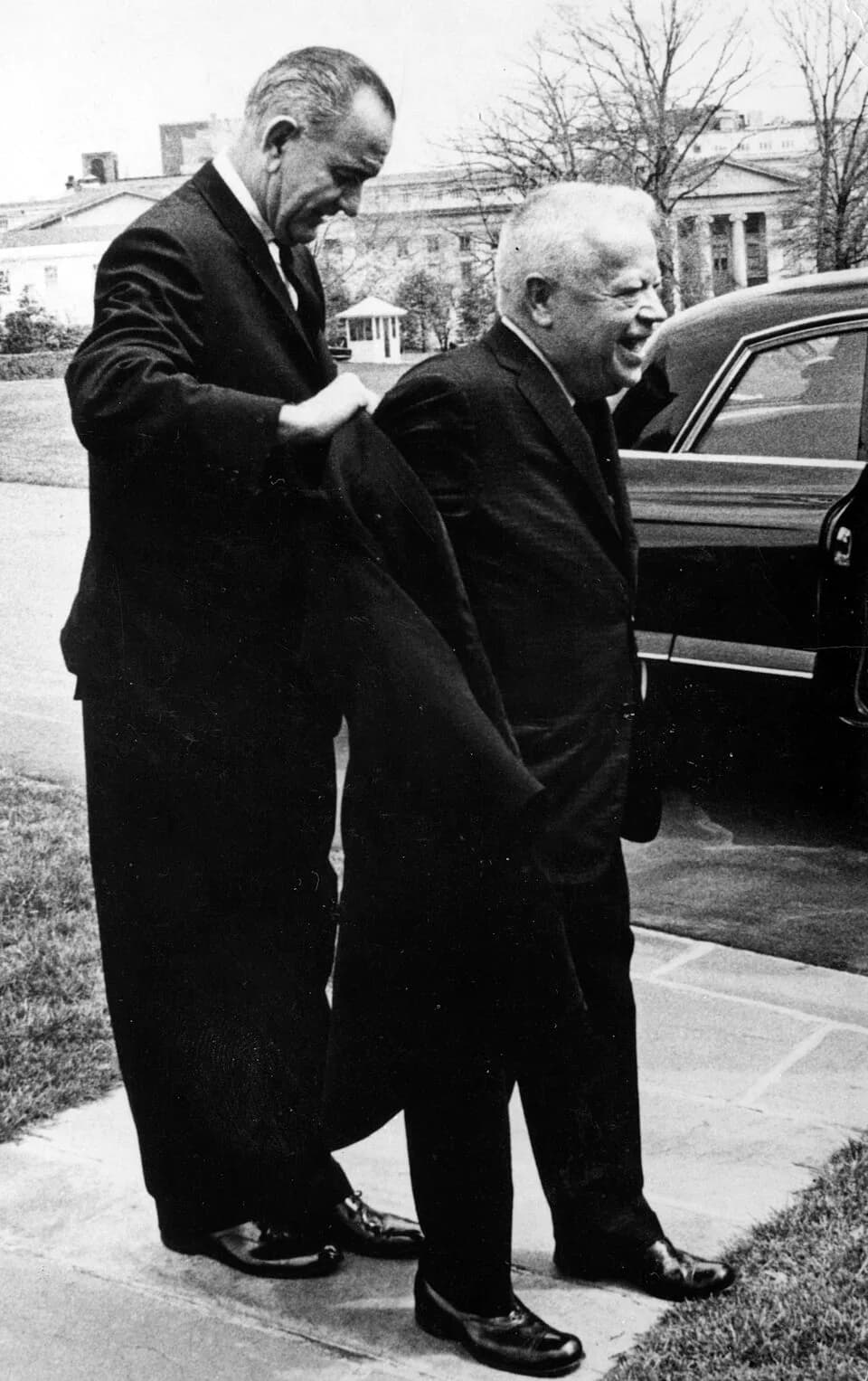 Lyndon B. Johnson - Title: Lyndon B. Johnson helps David Dubinsky put on his coat.
Date: Unknown
Photographer: Unknown
Photo ID: 5780PB15F12B