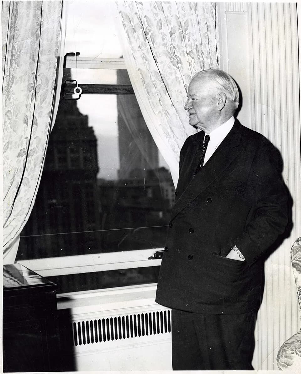 Herbert Hoover - Herbert Hoover is photographed in his suite in the Waldorf Astoria Towers.