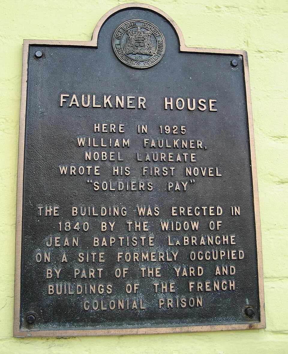 William Faulkner - Plaque marking former residence of writer William Faulkner, French Quarter, New Orleans. Pirate's Alley