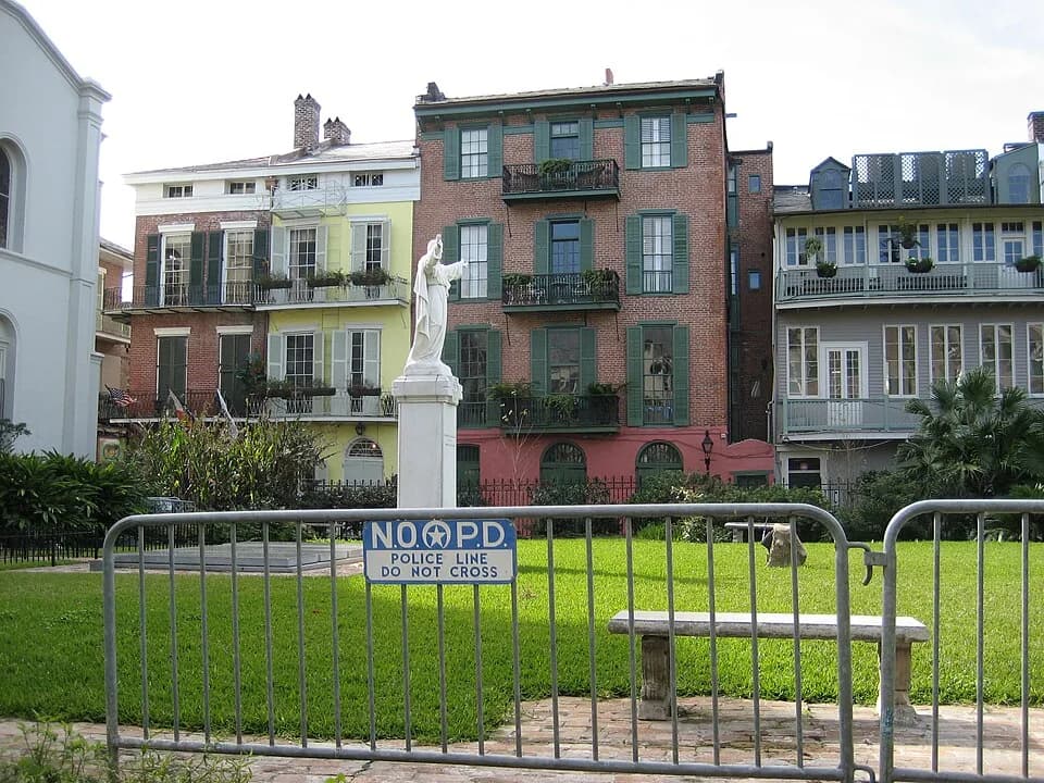 William Faulkner - French Quarter, New Orleans. View across back yard of St. Louis Cathedral to Pirate's Alley. Yellow house was formerly residence of writer William Faulkner