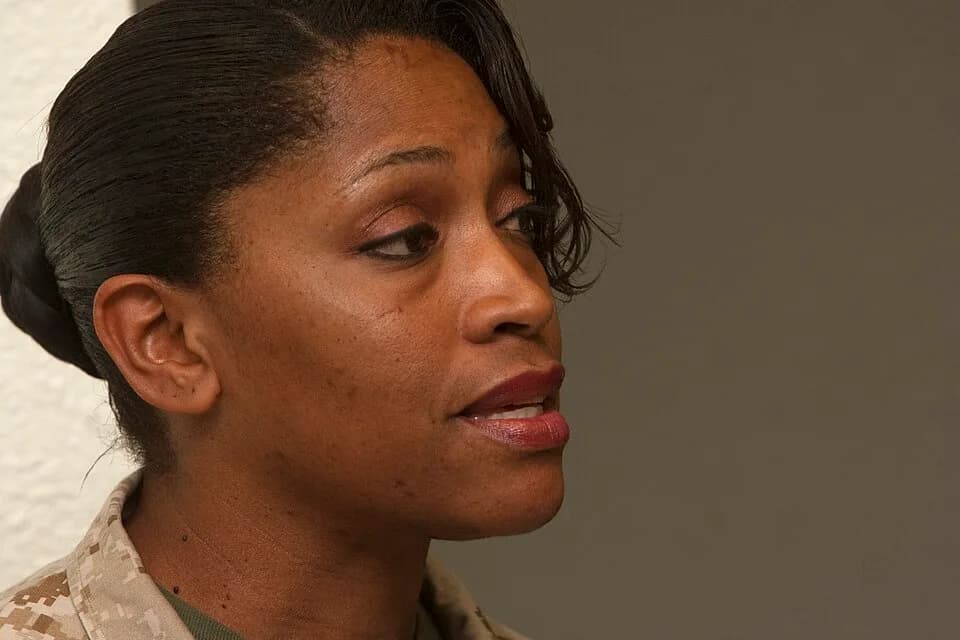 Maya Angelou - Master Sgt. Aretha Grubbs, Pacific Command’s administration chief, recites “Phenomenal Woman” by Maya Angelou Aug. 23 during U.S. Marine Corps Forces, Pacific’s Women’s Equality Day obs