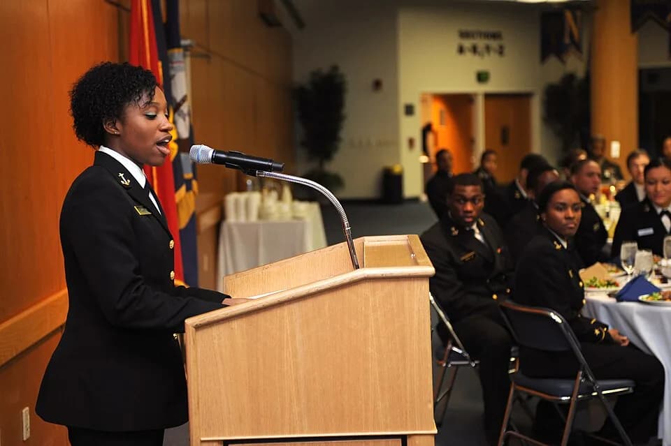 Maya Angelou - 150222-N-SQ432-041 ANNAPOLIS, Md. – Midshipman 4th Class Ashanti Curry recites Maya Angelou’s “Still I Rise” during the U.S. Naval Academy’s Black History Month celebration Feb. 22. Bla