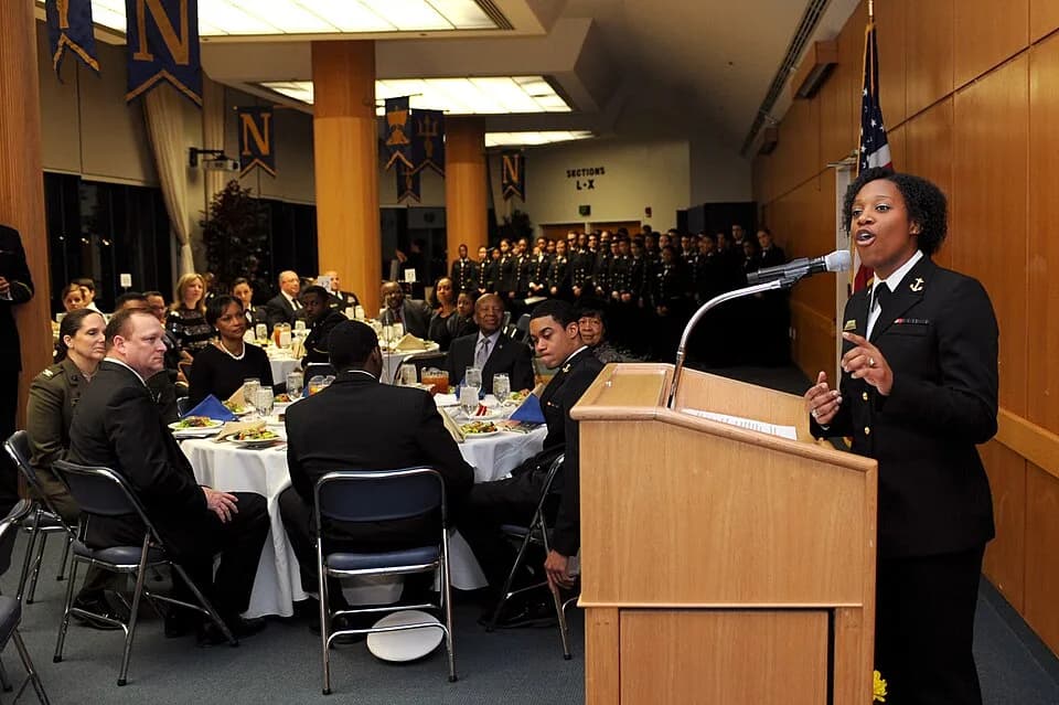 Maya Angelou - 150222-N-SQ432-049 ANNAPOLIS, Md. – Midshipman 4th Class Ashanti Curry recites Maya Angelou’s “Still I Rise” during the U.S. Naval Academy’s Black History Month celebration Feb. 22. Bla