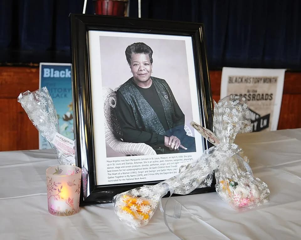 Maya Angelou - A photo of Maya Angelou, who was an author, poet, historian, songwriter, playwright, dancer, stage and screen producer, director, singer and civil rights activist, sits on display in pr