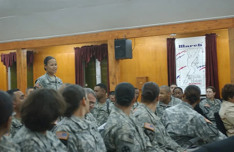 Maya Angelou - Spc. Magdalena Coleon, a native of Honolulu, with Co. A., Division Special Troops Battalion, 1st Cavalry Division, recites the poem, "Phenomenal Woman," by Maya Angelou, as she walks do