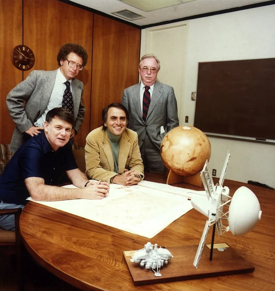 Carl Sagan - Carl Sagan, Bruce Murray (seated right to left) and (standing) Louis Friedman (standing, right), the founders of The Planetary Society at the time of signing the papers formally incorpora