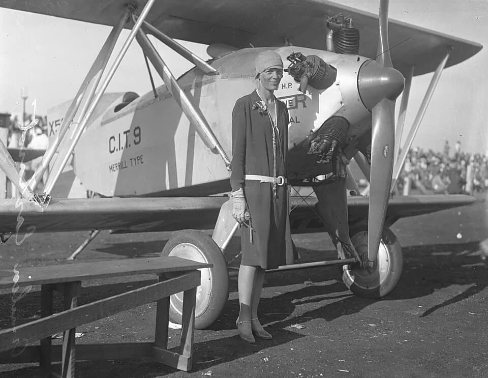 Amelia Earhart - Amelia Earhart — wearing a dress, standing beside a Merrill CIT-9 Safety Plane, circa 1928.
X5665 - 1926 "CIT-9 Safety Plane" - California Institute of Technology (Caltech) Aerospace 