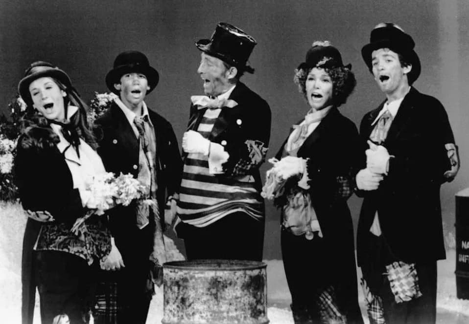 Bing Crosby - Photo of Bing Crosby and family in a skit from his 1974 Christmas special.  From left: Mary Frances, Nathaniel, Bing, Kathryn and Harry.  Crosby has four sons from his first marriage.