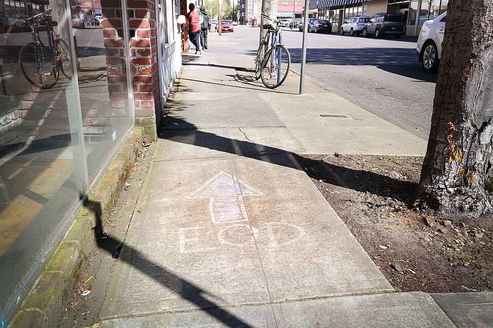 H. P. Lovecraft - A chalk sign directing foot traffic to the Esoteric Order of Dagon at the H.P. Lovecraft Film Festival and CthulhuCon in Portland, Oregon