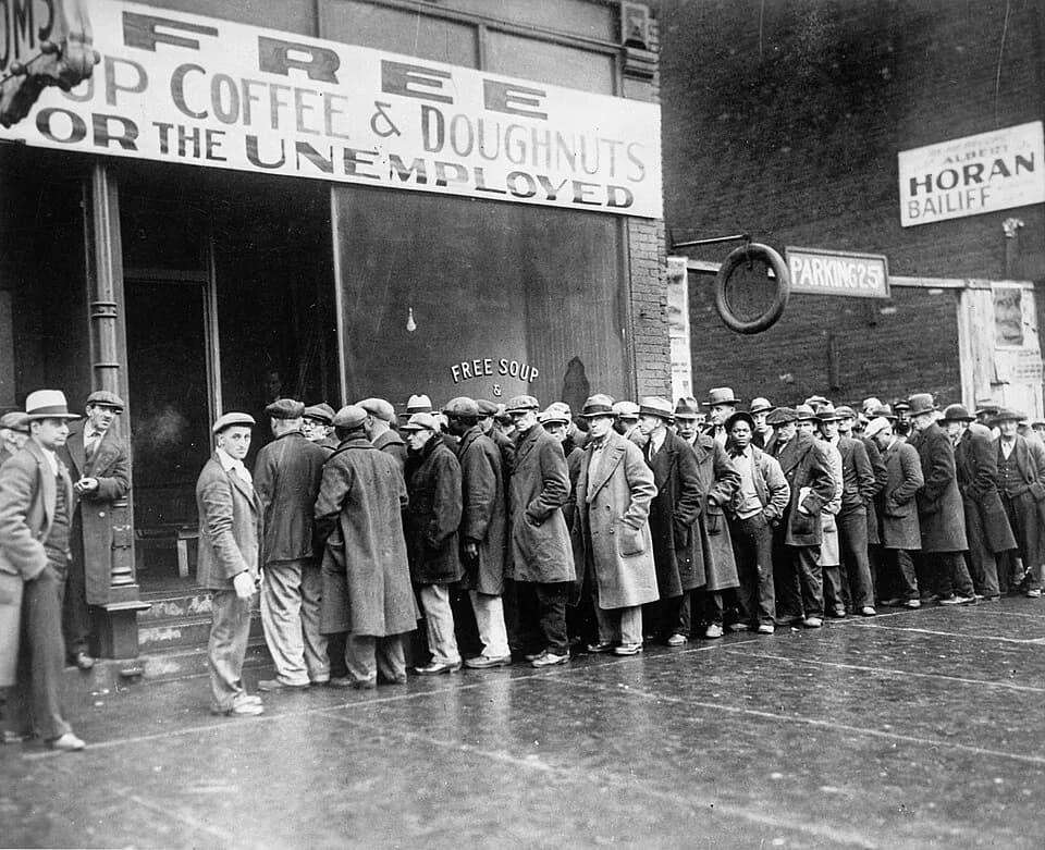 Al Capone - The storefront sign reads "Free Soup Coffee &amp; Doughnuts for the Unemployed."