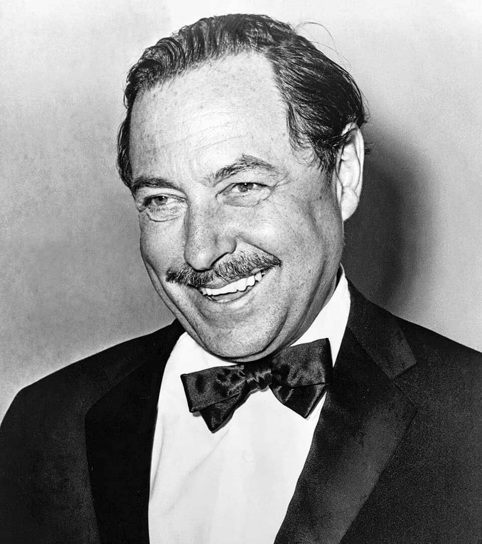 Tennessee Williams - Tennessee Williams, American playwright; cropped from photo of Williams with cake for 20th anniversary of "The Glass Menagerie"