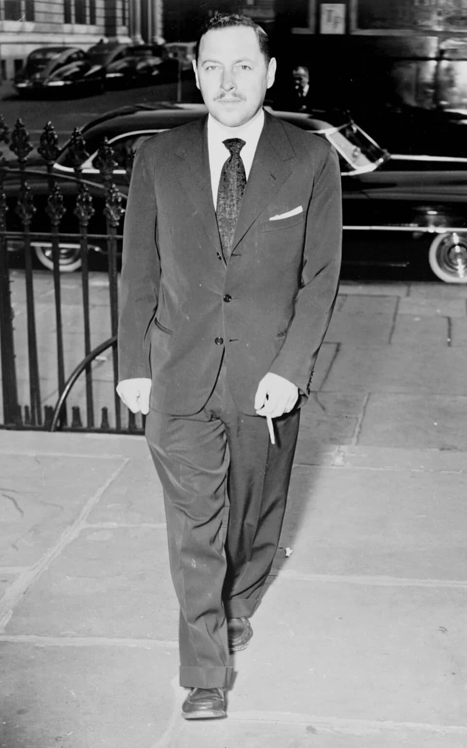 Tennessee Williams - Tennessee Williams, full-length portrait, walking, at service for Dylan Thomas, facing front / World Telegram & Sun photo by Walter Albertin.
