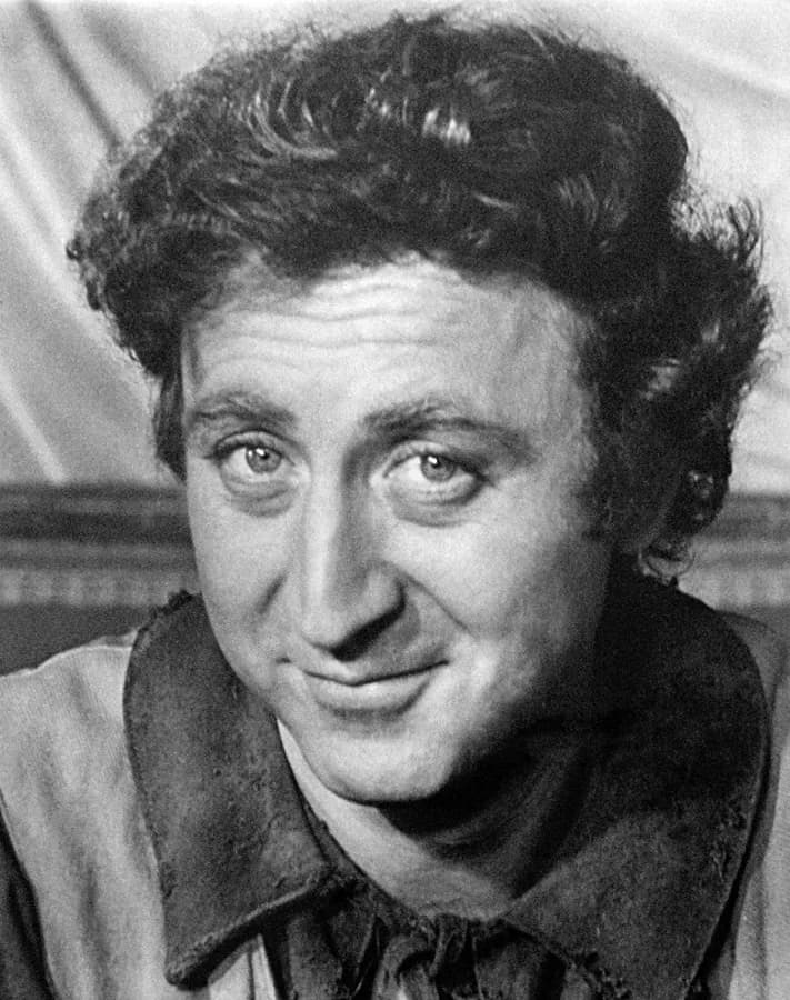 Gene Wilder - Publicity photo of Gene Wilder for film Start the Revolution Without Me (1970), also known as Two Times Two. Original upload shows full margins and back of photo with film description.