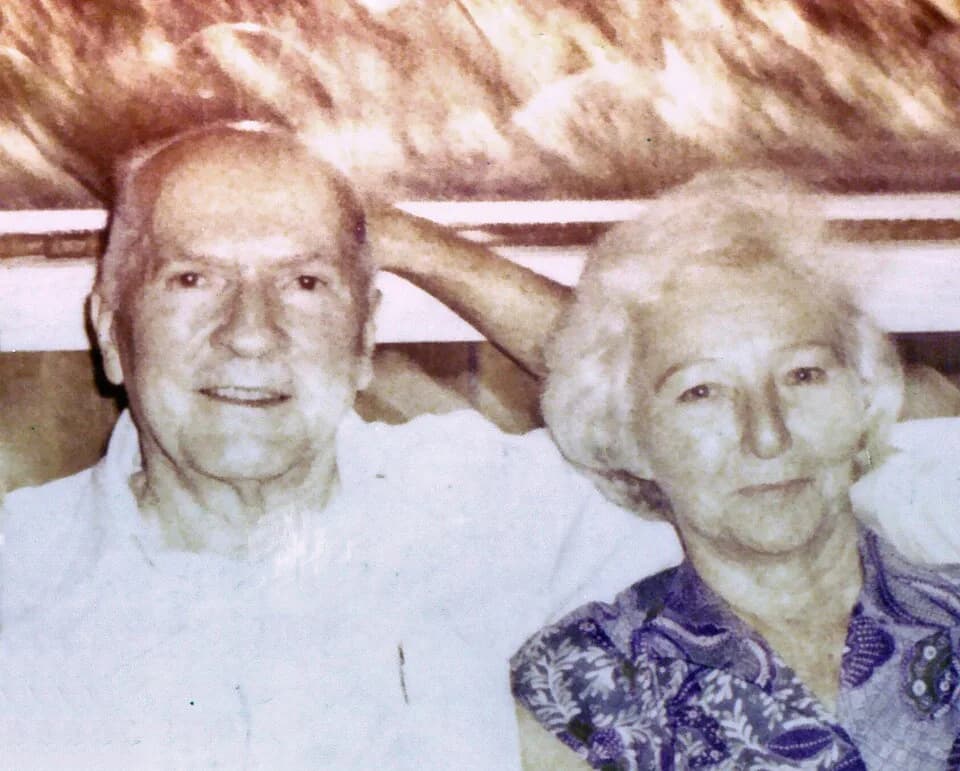 Robert A. Heinlein - Robert A. Heinlein with Ginny Heinlein in 1980 in Tahiti.

Original description was: Robert A. Heinlein, with Ginny Heinlein and Douchka Peirce. My stepson took this picture in 19