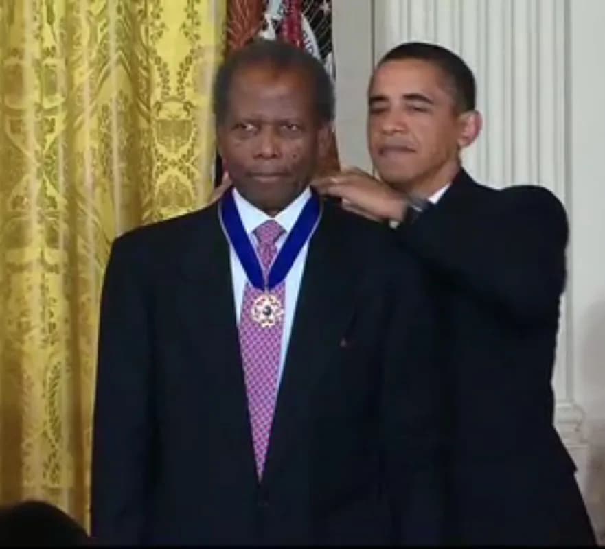 Sidney Poitier - Actor Sidney Poitier receives the Presidential Medal of Freedom from President Barack Obama on August 12, 2009.