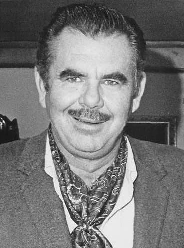 Roger Ebert - Image uploaded to English Wikipedia by w:en:user:Rebert, who claims to be Roger Ebert. Ebert placed a GFDL license on his image, upon uploading.
The photo is of director Russ Meyer (left