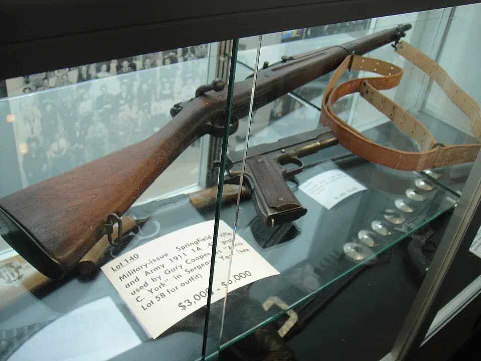 Gary Cooper - Military-issue Springfield rifle and Army 1911 1A .45 pistol used by Gary Cooper in "Sergeant York" at the Debbie Reynolds Auction Breaks Up Historic Hollywood Collection (The Paley Cent