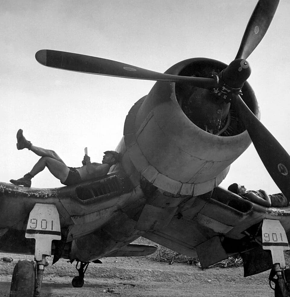 Charles Lindbergh - U.S. Marines of Marine fighter squadron VMF-222 Flying Deuces relaxing in between strikes on a Vought F4U-1 Corsair on Bougainville, Solomon Islands, in April 1944.