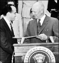 Jonas Salk - Photo of Dr. Jonas Salk receiving a Gold Medal from President Eisenhower