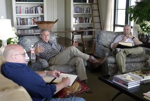 Colin Powell - George W. Bush with Colin Powell and the Deputy Secretary of State at the Prairie Chapel Ranch.