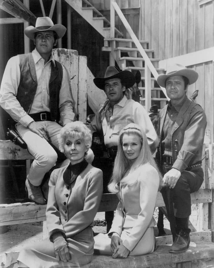 Barbara Stanwyck - Cast photo from the television Western The Big Valley. Back, from left-Lee Majors, Peter Breck, Richard Long. Front-Barbara Stanwyck, Linda Evans.