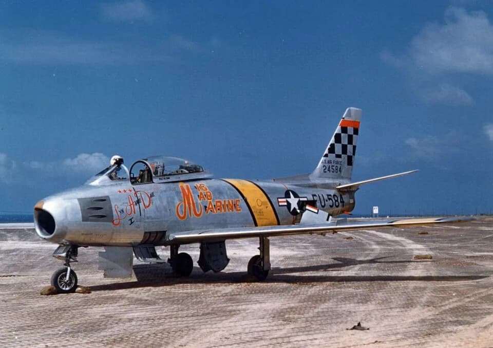 John Glenn - A U.S. Air Force North American F-86F-30-NA Sabre (s/n 52-4584) in 1953. This plane was flown by U.S. Marine Corps Major John H. Glenn and dubbed "MiG Mad Marine". Glenn flew this aircraf