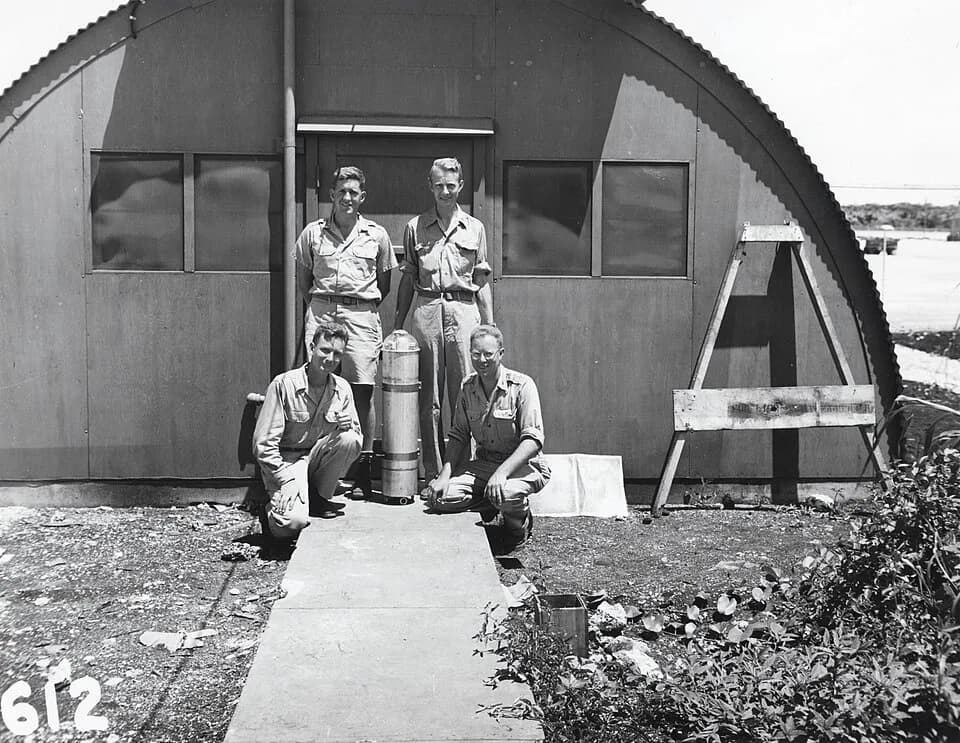 Luis Walter Alvarez - Harold Agnew, Luis Walter Alvarez, Lawrence Johnston, and Bernard Waldman on Tinian, Marianas, with a parachute-borne pressure gauge. "Scientific observers" of the 509th group.