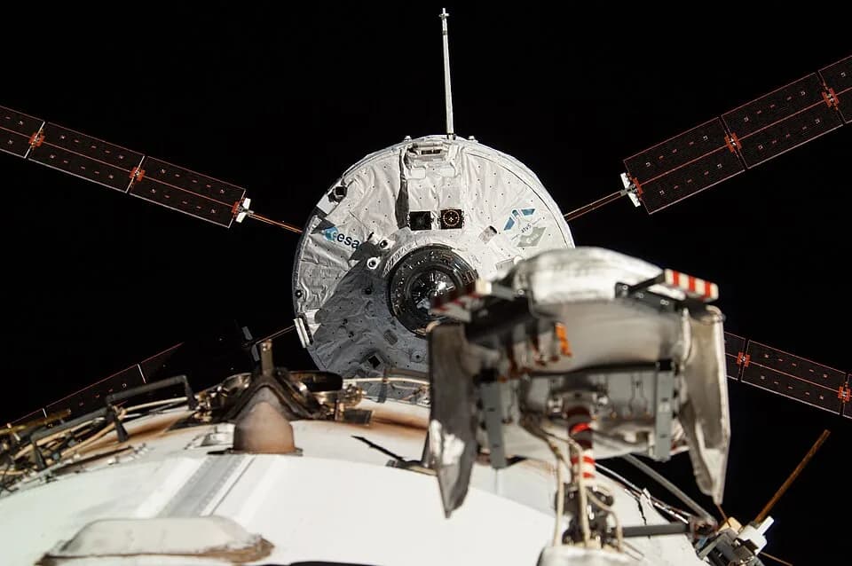 Georges Lemaître - The "Georges Lemaitre" Automated Transfer Vehicle (ATV-5), photographed by an Expedition 40 crew member, is about to dock to the aft port of the International Space Station's Zvezda