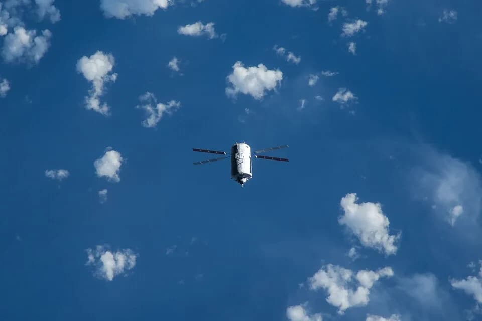 Georges Lemaître - The "Georges Lemaitre" Automated Transfer Vehicle (ATV-5), photographed by an Expedition 40 crew member, flies directly under the International Space Station at a distance of about 