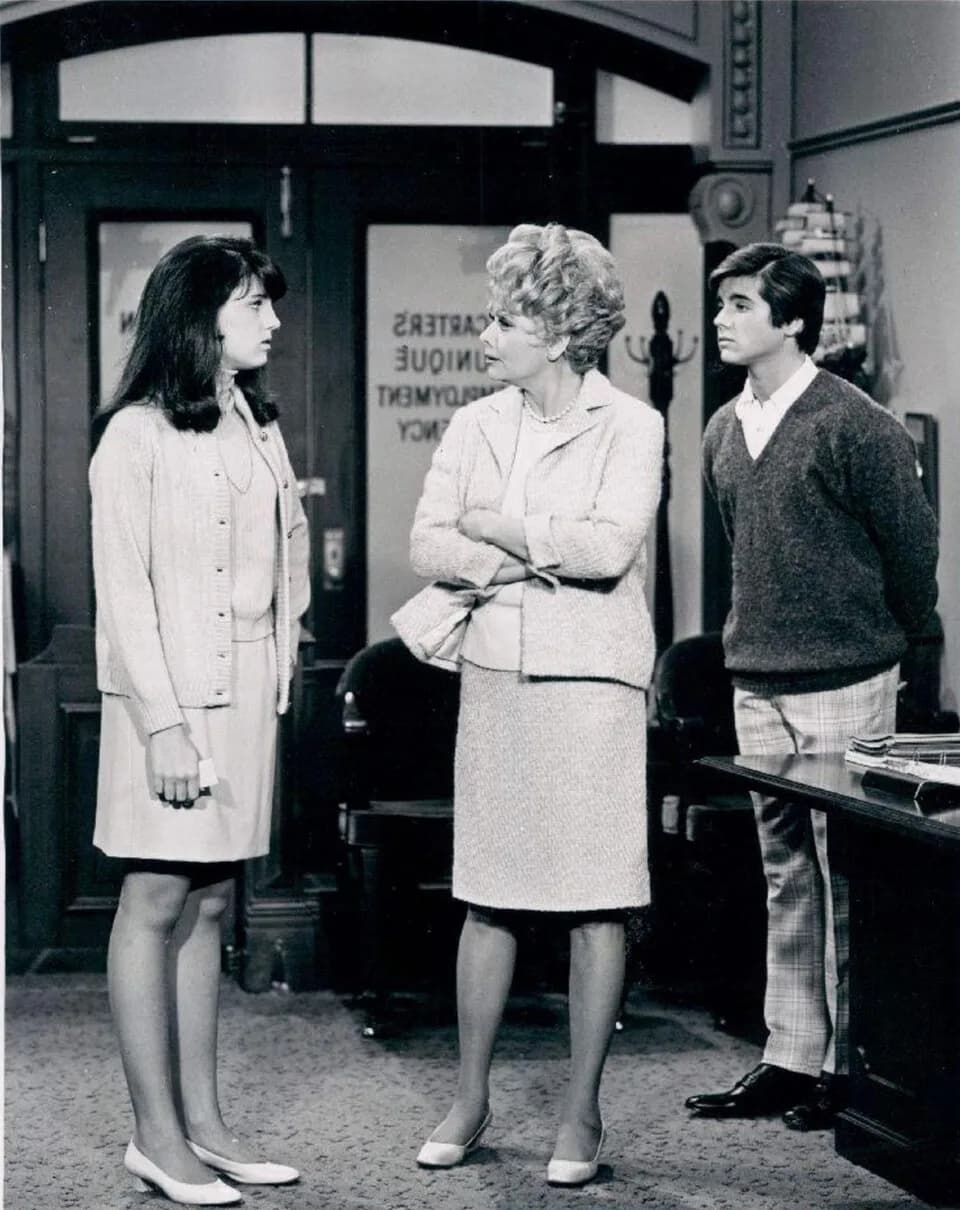 Lucille Ball - Publicity photo from Here's Lucy.  Pictured are Lucie Arnaz, Lucille Ball and Desi Arnaz, Jr. The scene is Carter's Unique Employment Agency where Lucy works.