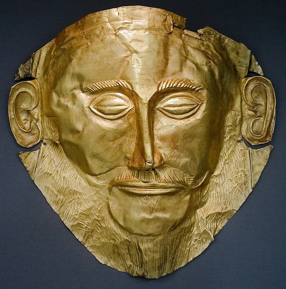 Heinrich Schliemann - Funeral mask also known as “Agamemnon Mask”. Gold, found in Tomb V in Mycenae by Heinrich Schliemann (1876), XVIth century BC. National Archeological Museum, Athens.