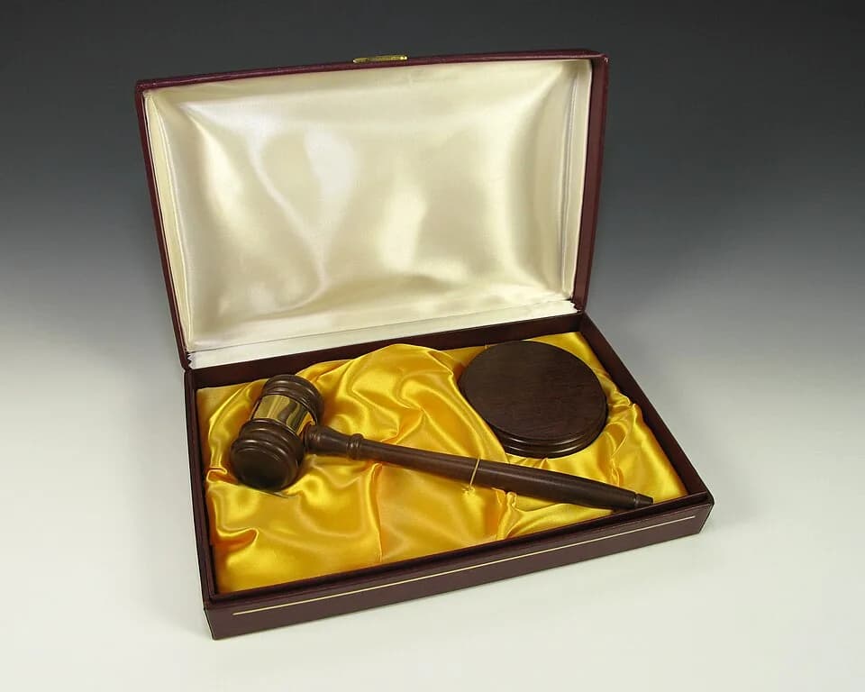 Betty Ford - Presentation wooden gavel with base housed in a cardboard box lined with yellow silk. The plaque on the gavel says, “Betty Ford / President / Betty Ford Center.”