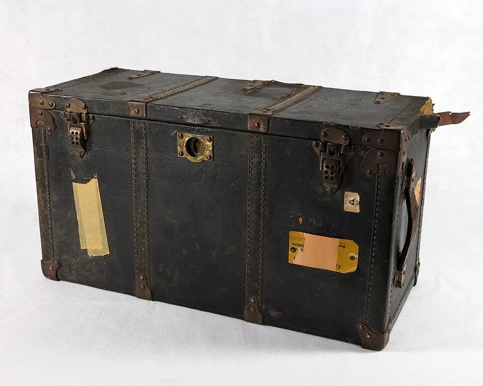 Betty Ford - Travel trunk used by Betty (Bloomer) Ford while working as a dance instructor at Camp Bryn Afron in northern Wisconsin during the early 1940s. Stickers throughout indicate she most likely
