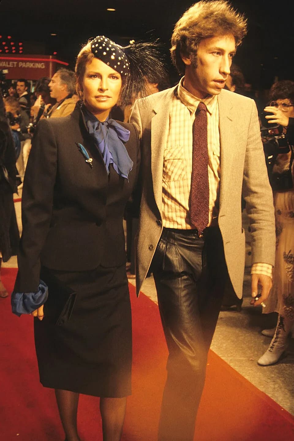 Raquel Welch - Raquel Welch and husband Andre Weinfeld arrive at the premiere of Midler's movie, THE ROSE, 1979.